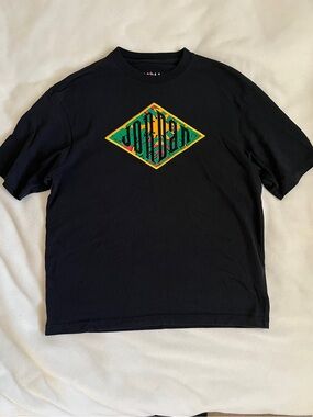 Jordan Sport DNA t-shirt featuring a colorful embroidered diamond logo medium